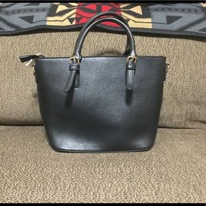 Isabelle black medium purse w/gold-tone hardware.